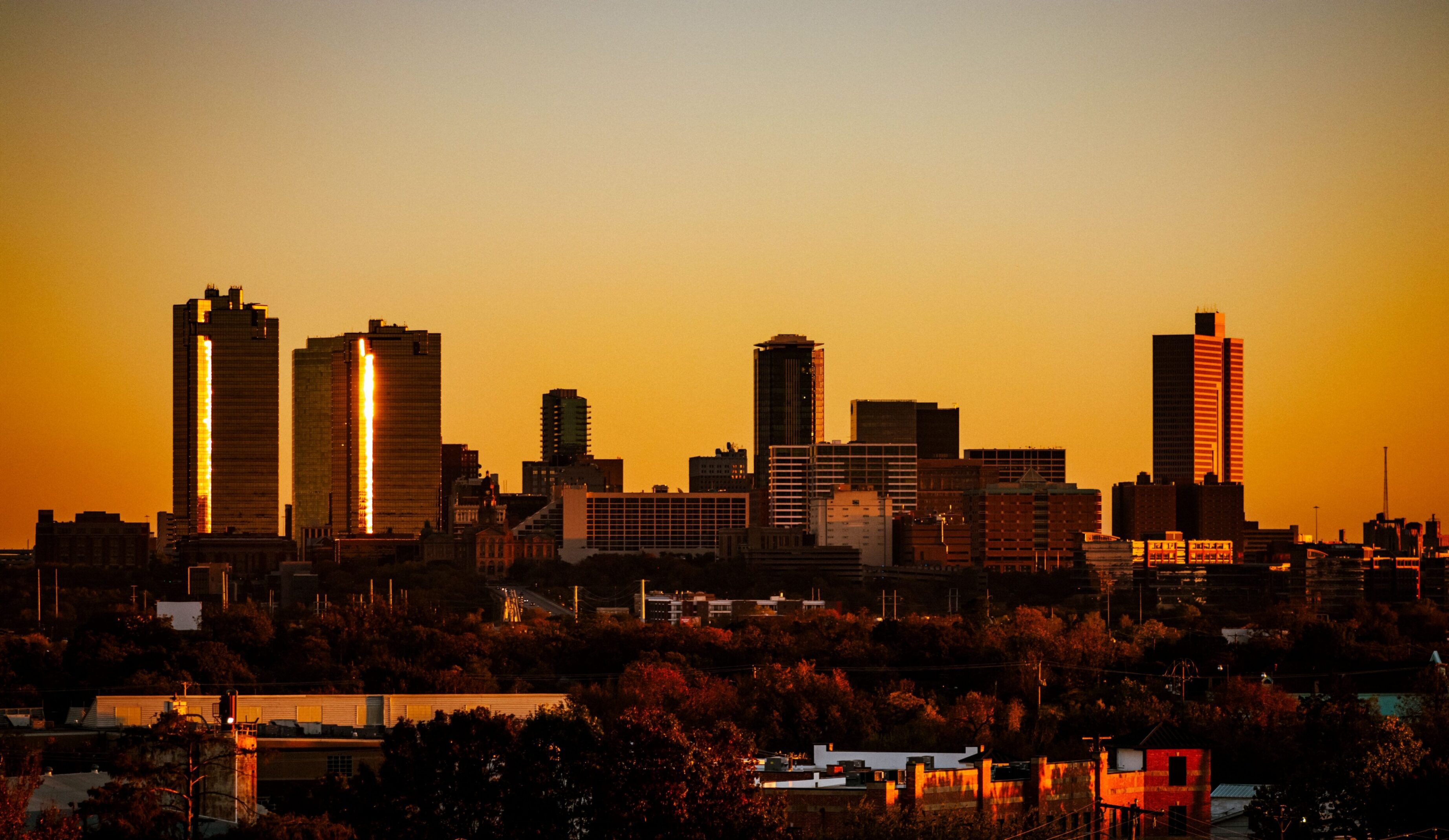 Fort Worth skyline under a dramatic sunset